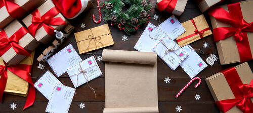 Merry,Christmas,Decorated,Wooden,Table,With,Wish,List,,Post,Mail